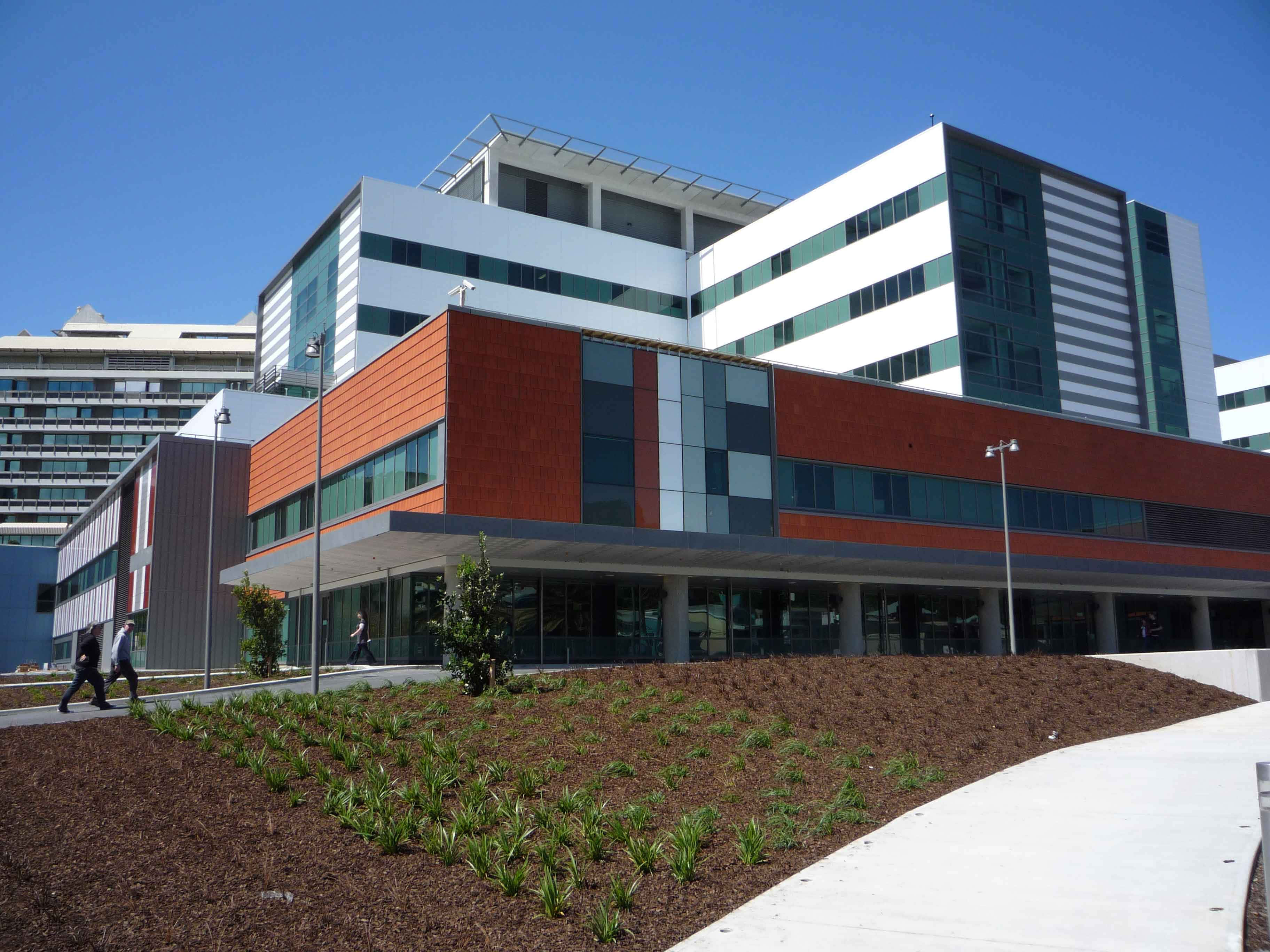 Lower Hutt, modern hospital building, red and white facade, 2K Desktop Wallpaper