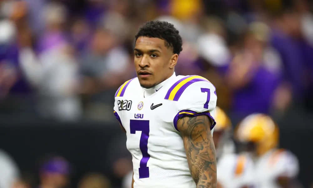 LSU Football, player number 7, white and purple uniform, SD Desktop Wallpaper