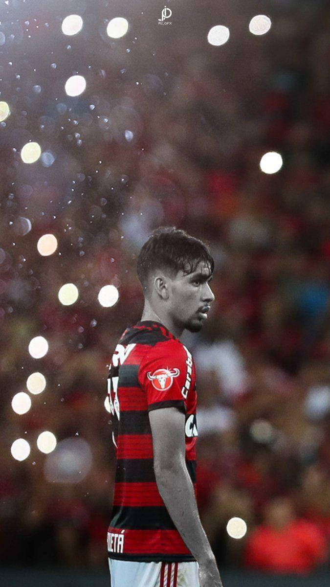 Lucas Paquetá, red and black striped jersey, stadium lights, SD Phone Wallpaper