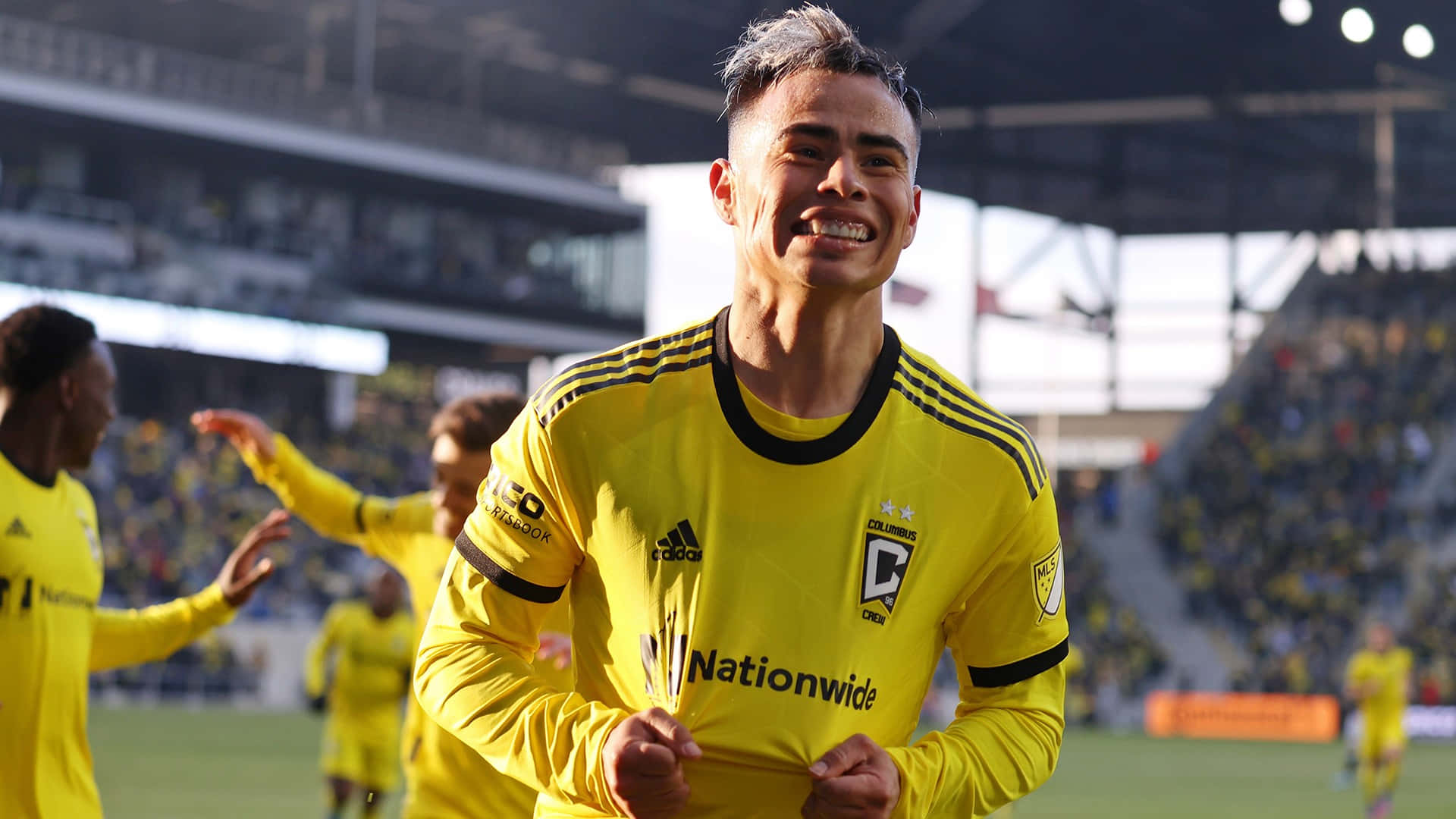 Lucas Zelarayan, yellow jersey, sunlit stadium field, Full HD Desktop Wallpaper