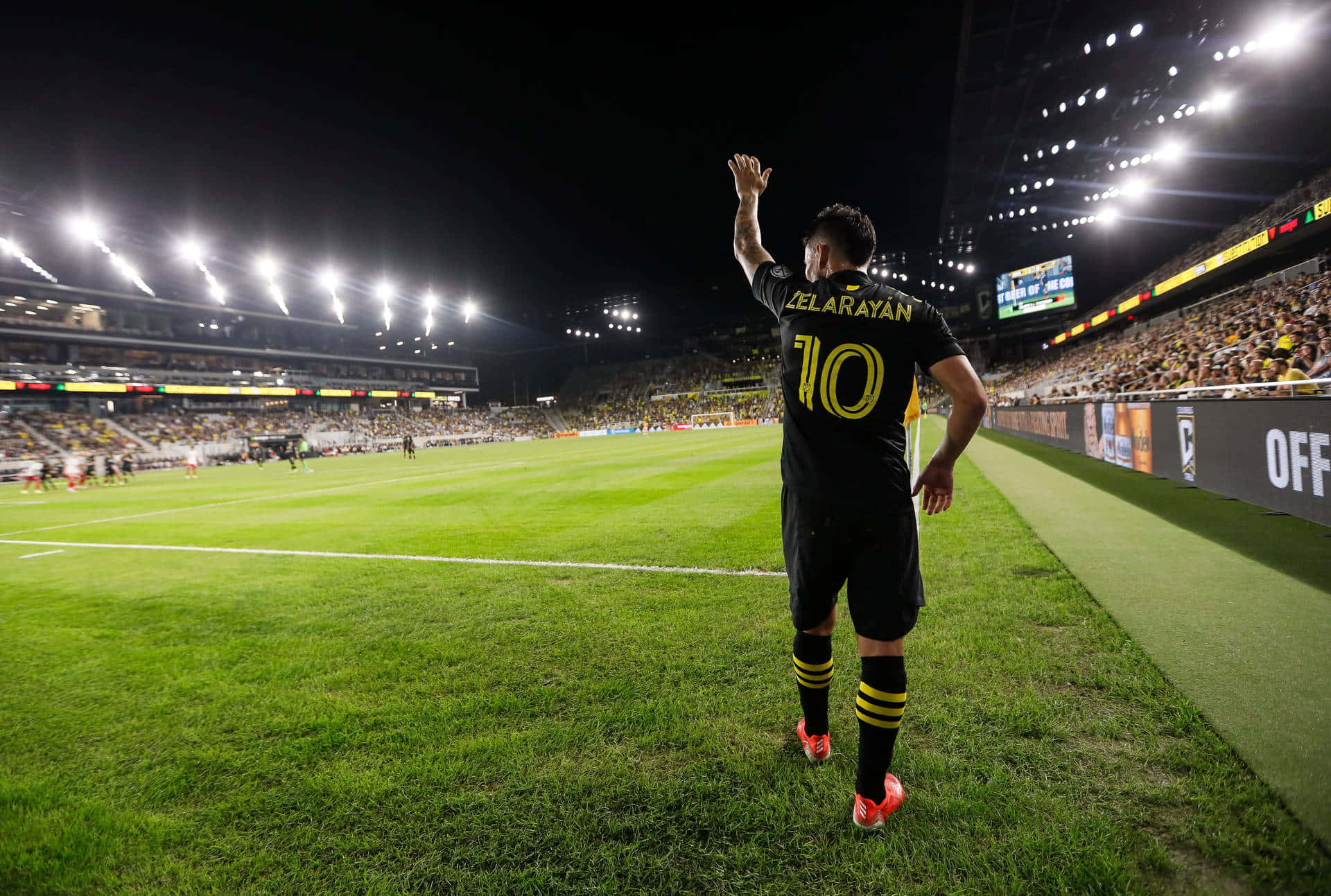 Lucas Zelarayan, black and yellow jersey, brightly lit stadium field, Full HD Desktop Wallpaper