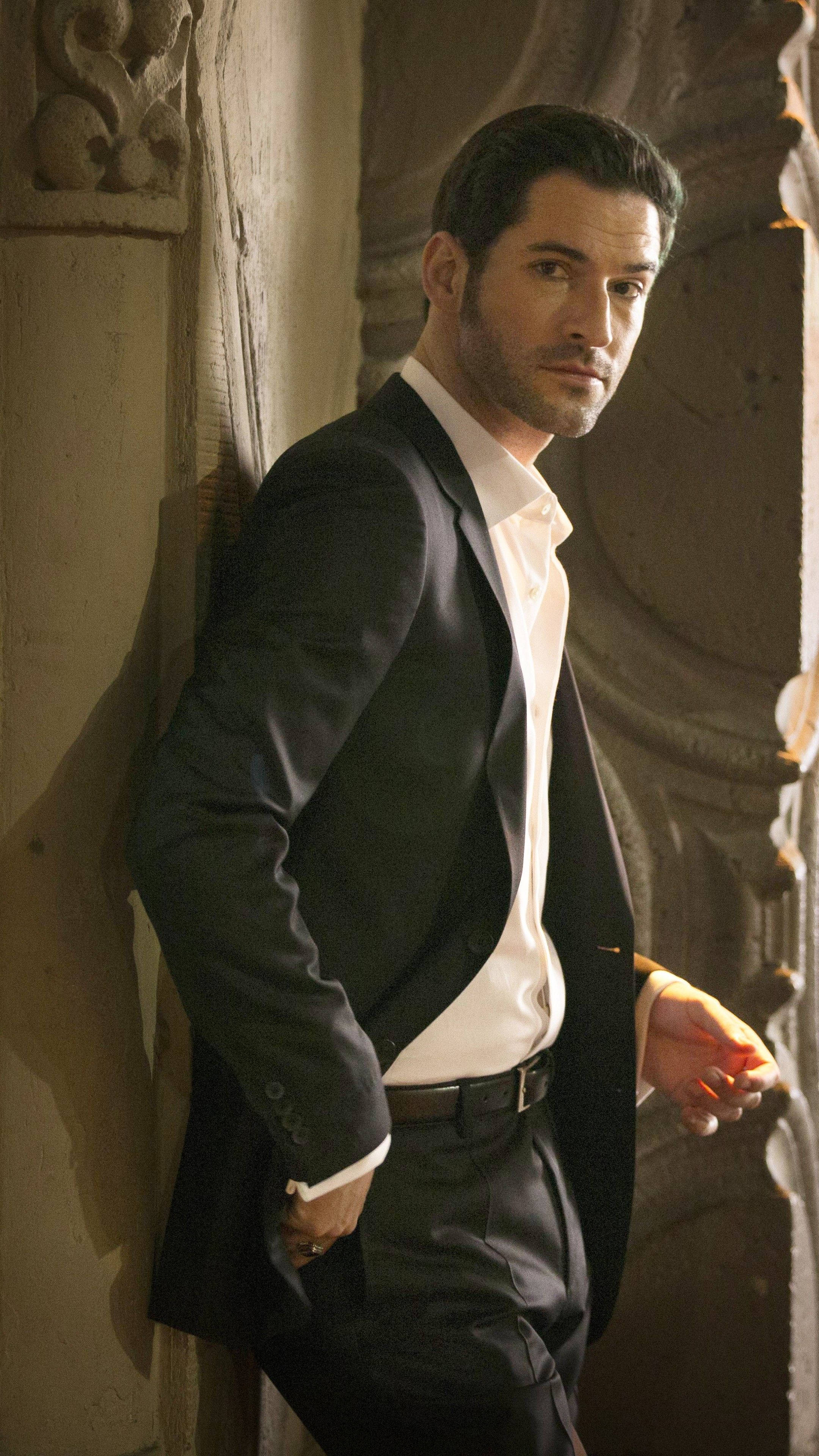 Lucifer Morningstar, black suit, ornate stone columns, 4K Phone Wallpaper