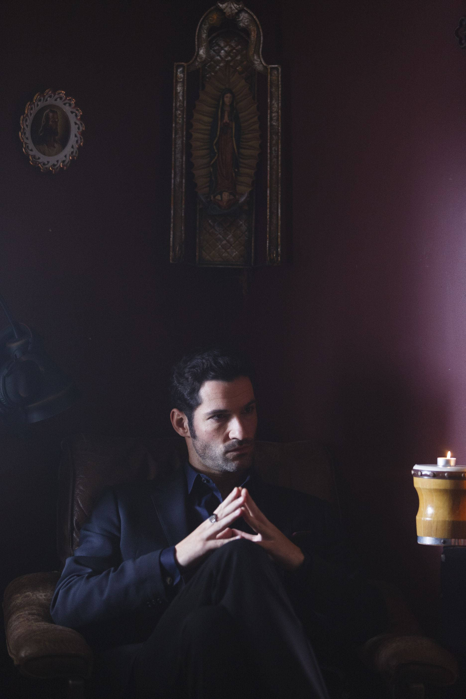 Lucifer, dark suit, dimly lit room, 2K Phone Wallpaper