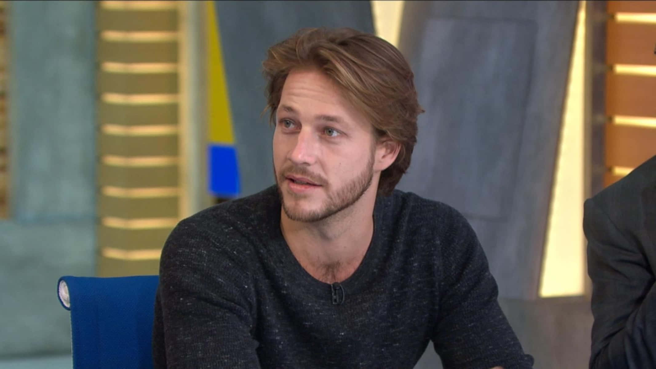 Luke Bracey, blue chair, studio setting, Full HD Desktop Wallpaper