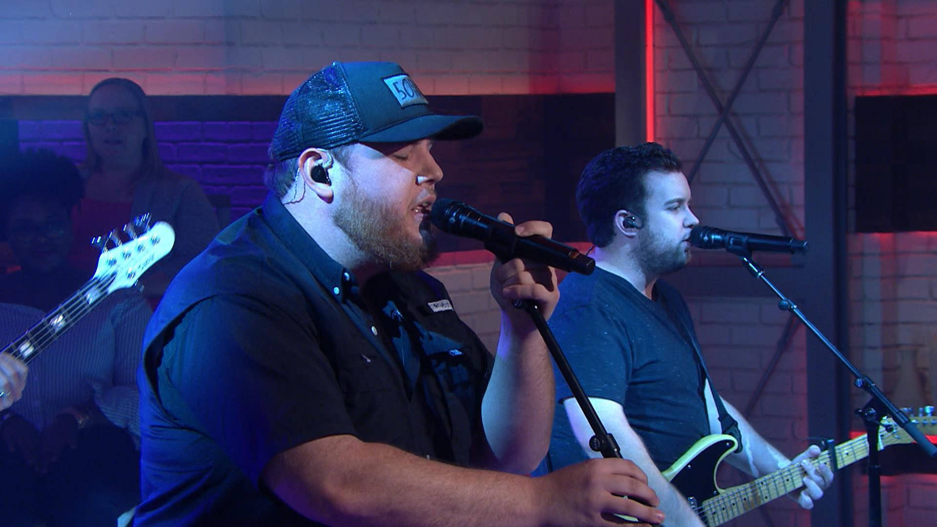 Luke Combs, vibrant blue and red stage lights, brick walls, Full HD Desktop Wallpaper