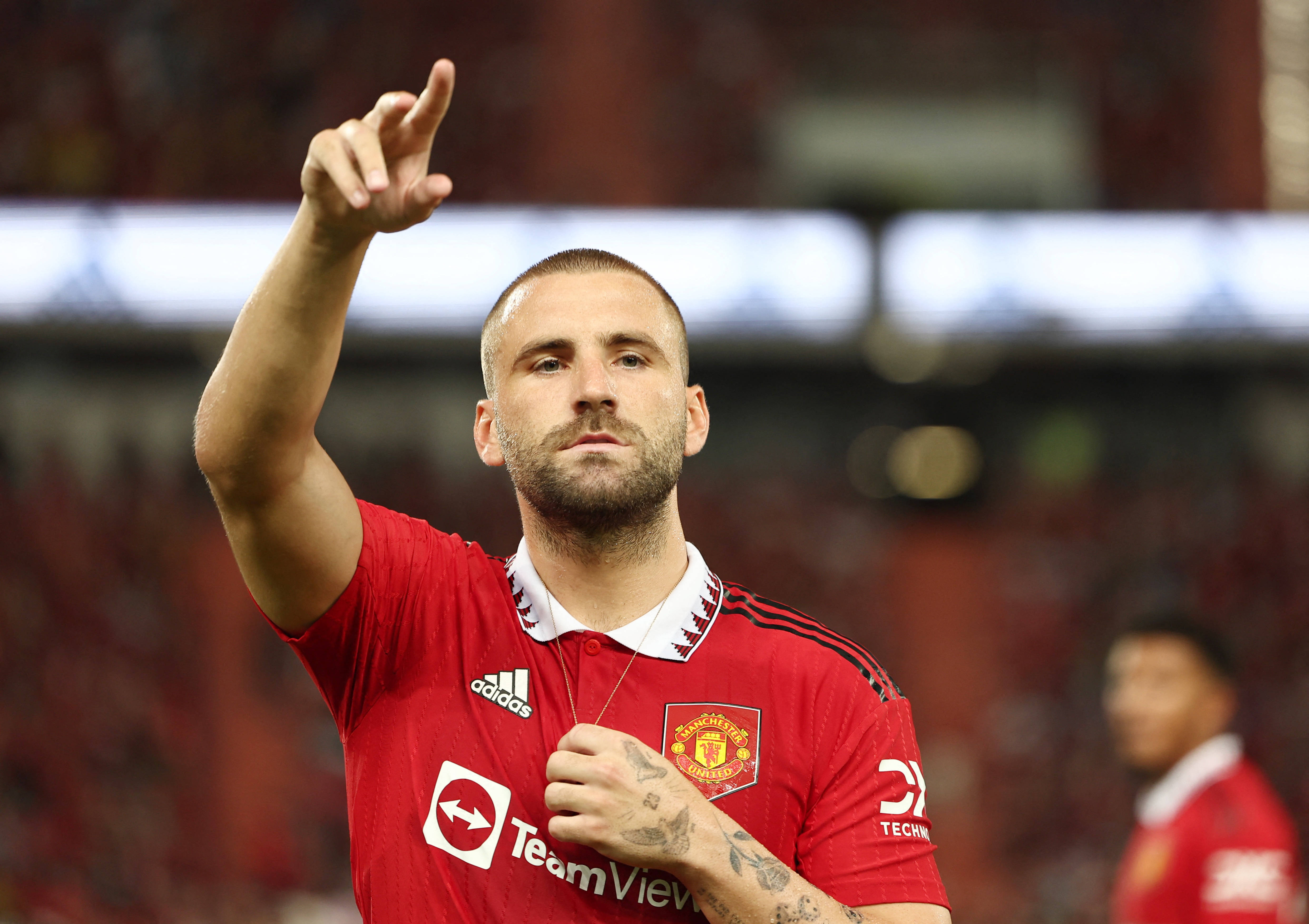 Luke Shaw, red Manchester United jersey, stadium pitch, 4K Desktop Wallpaper