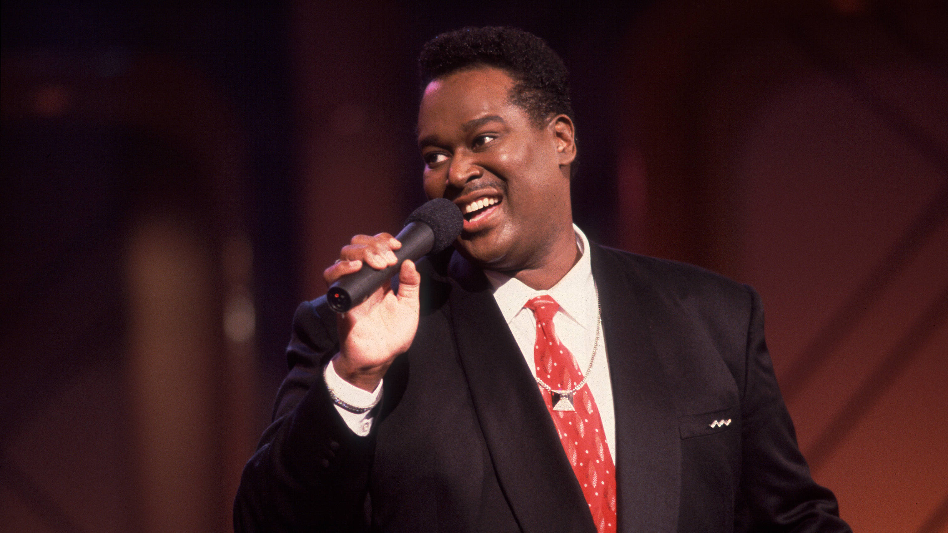 Luther Vandross, black suit, red tie, 2K Desktop Wallpaper