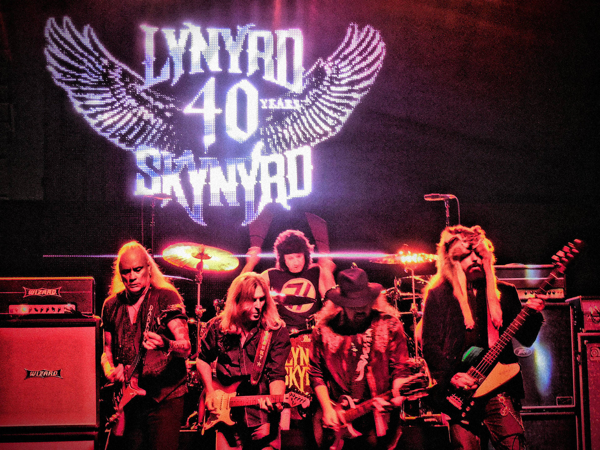 Lynyrd Skynyrd, 40th Anniversary Performance, glowing '40 Years' wings logo, Full HD Desktop Wallpaper