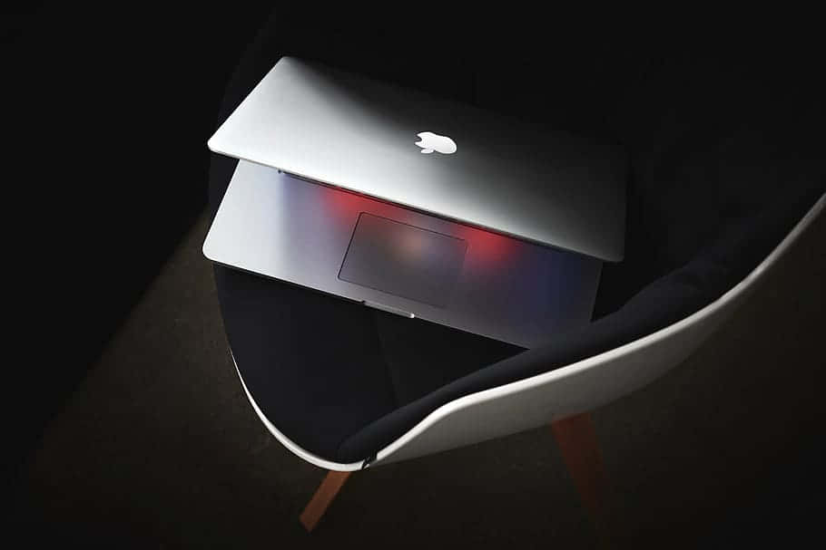 MacBook Air M2, silver, modern white chair, SD Desktop Wallpaper
