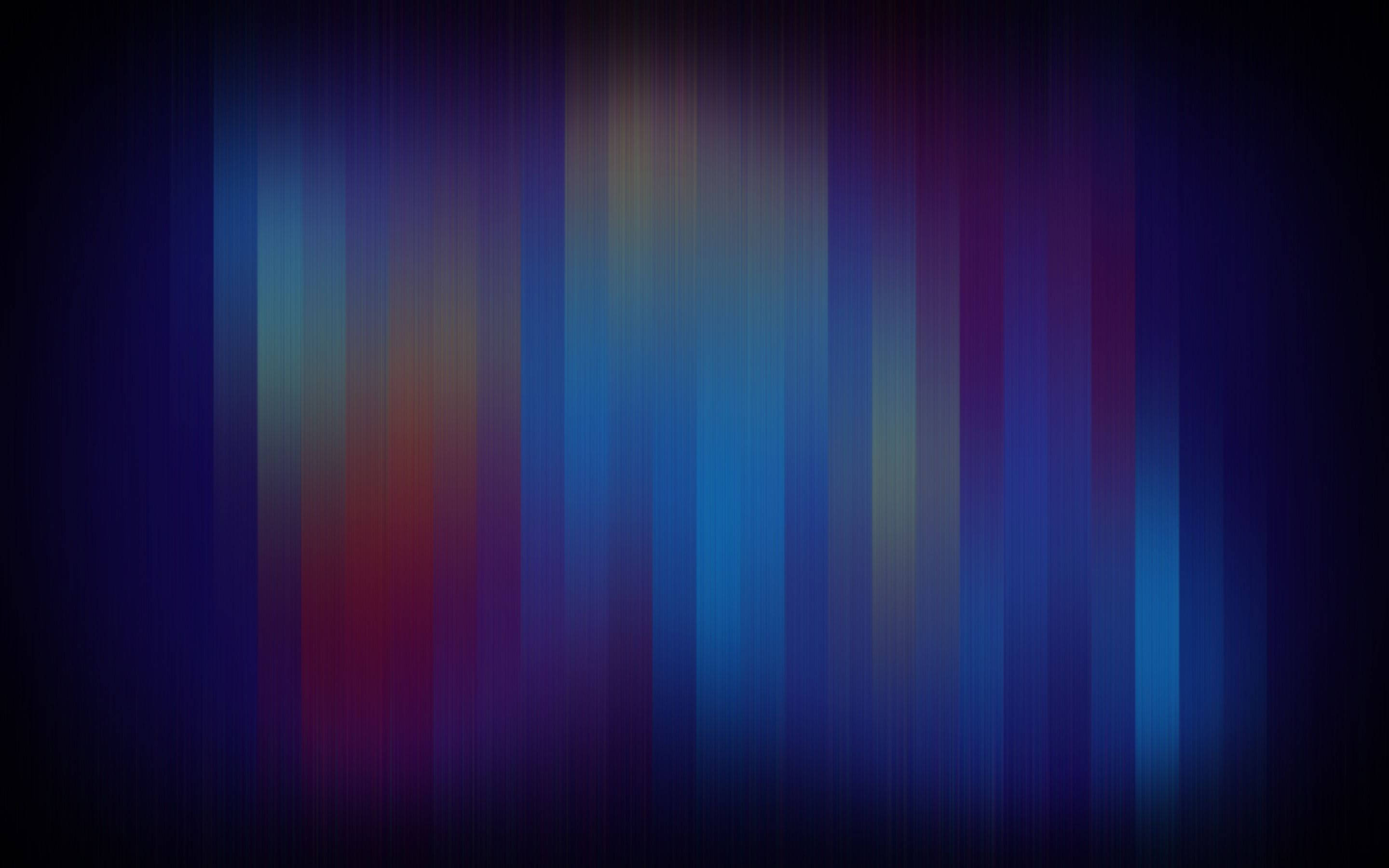Macbook, glowing blue purple and red light, vertical streaks, 2K Desktop Wallpaper