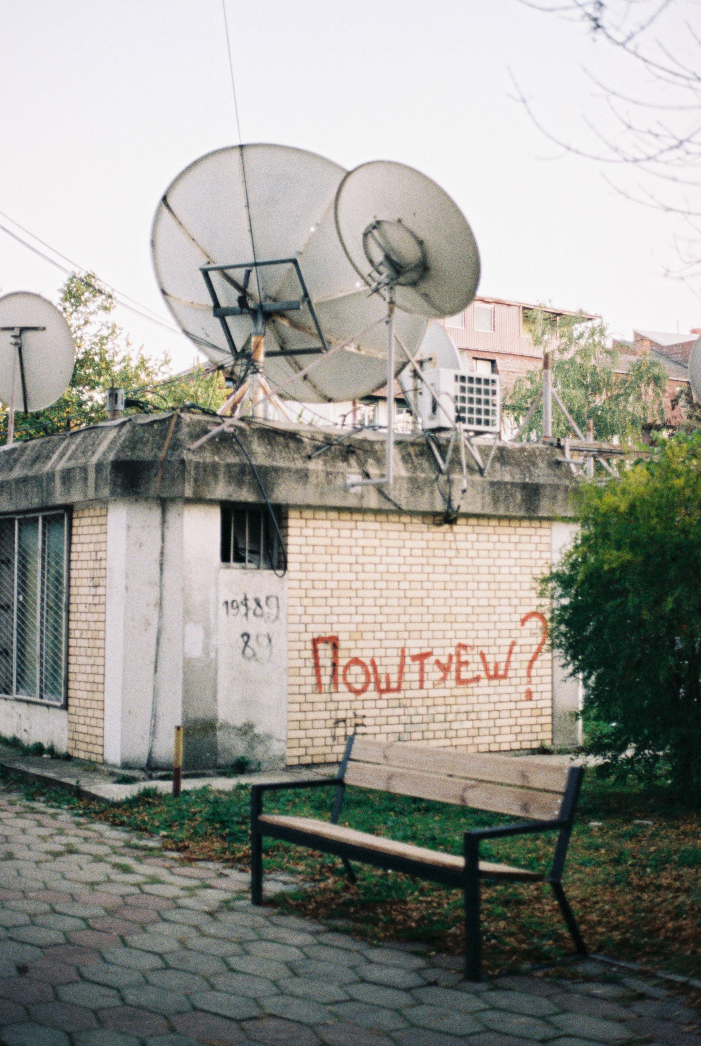 Macedonia, satellite dishes, weathered brick building, 2K Phone Wallpaper