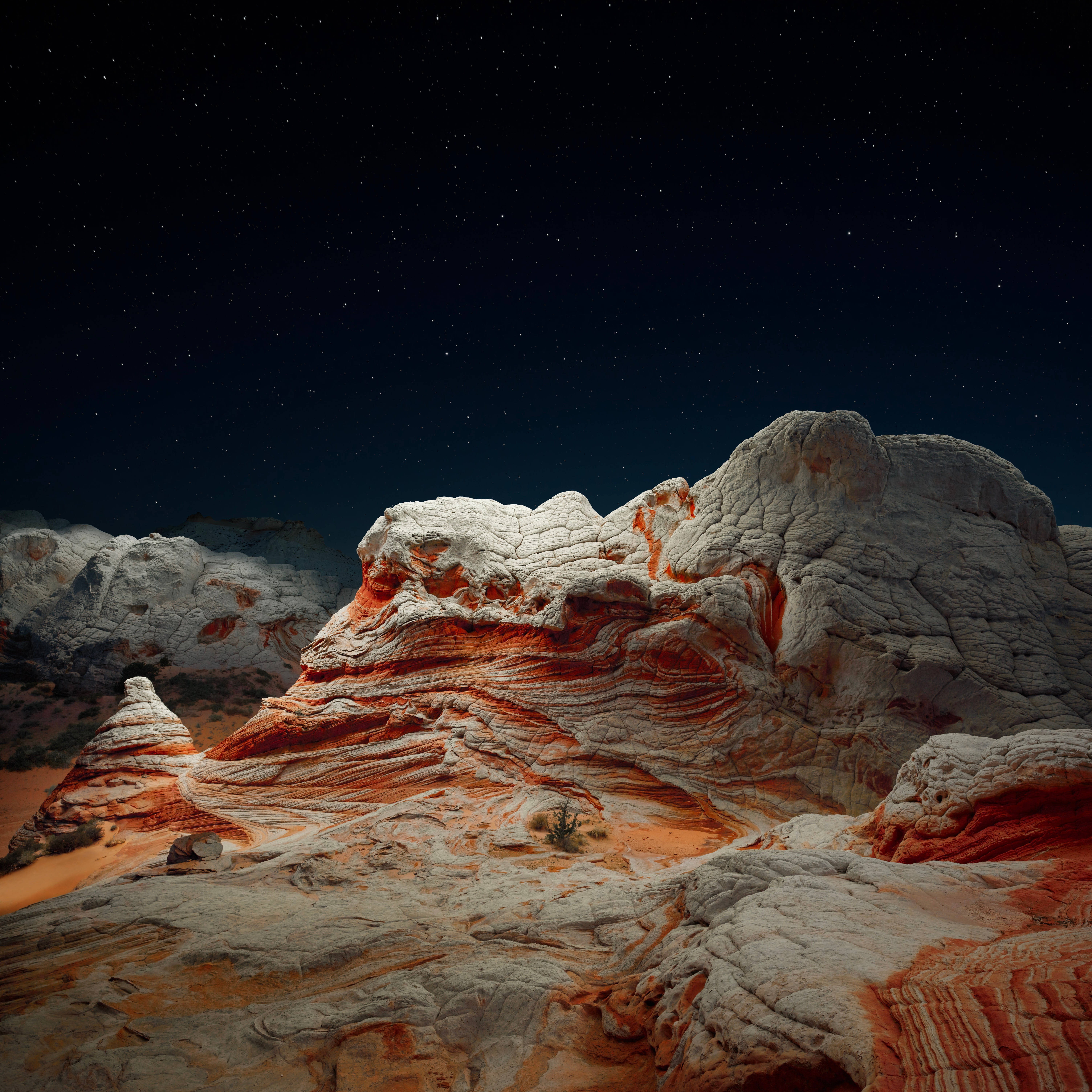 macOS Big Sur, starry night sky, layered red and white rock formations, 5K Desktop Wallpaper