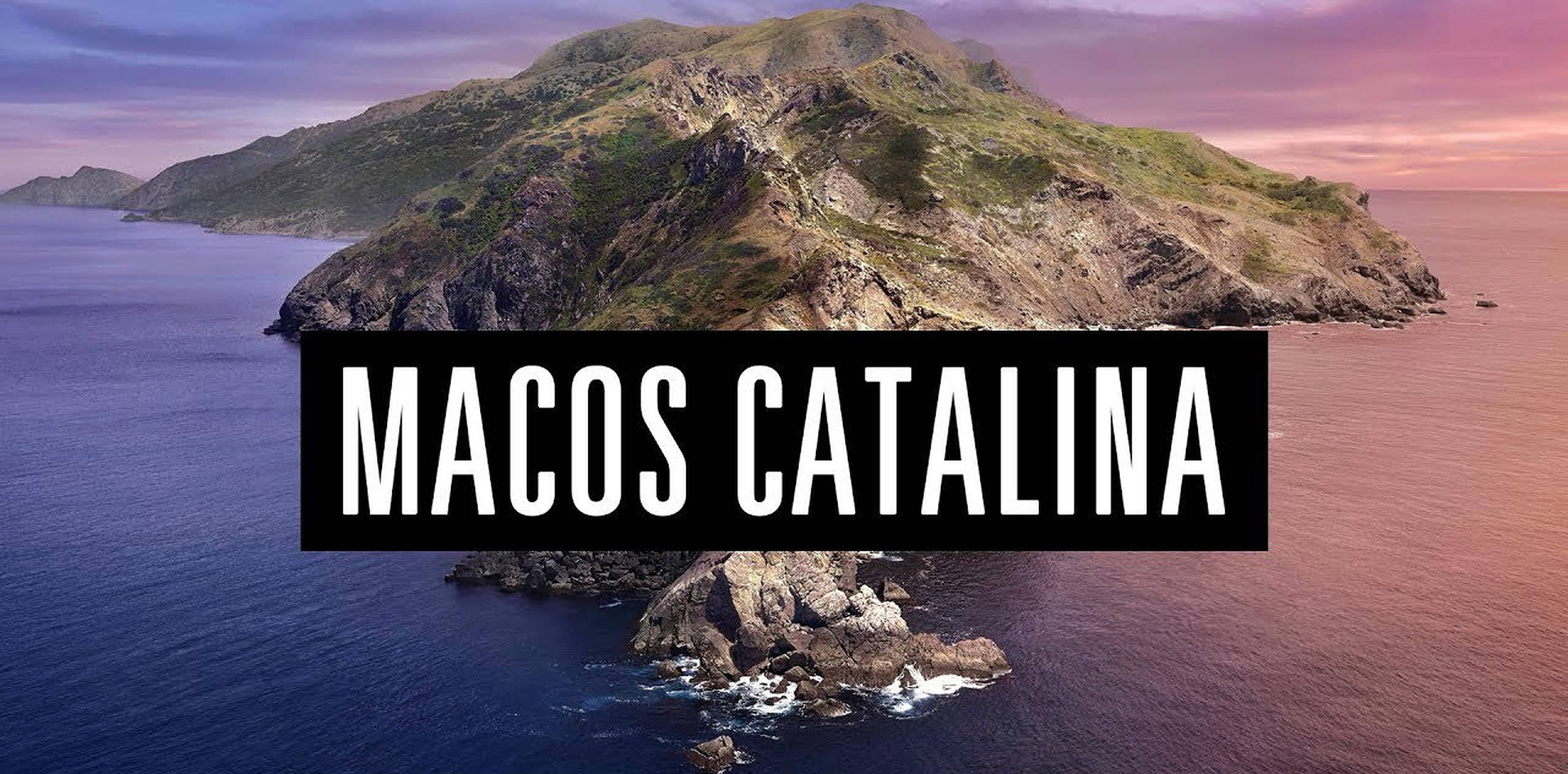 macOS Catalina, pink and purple sunset sky, deep blue waters, 2K Desktop Wallpaper