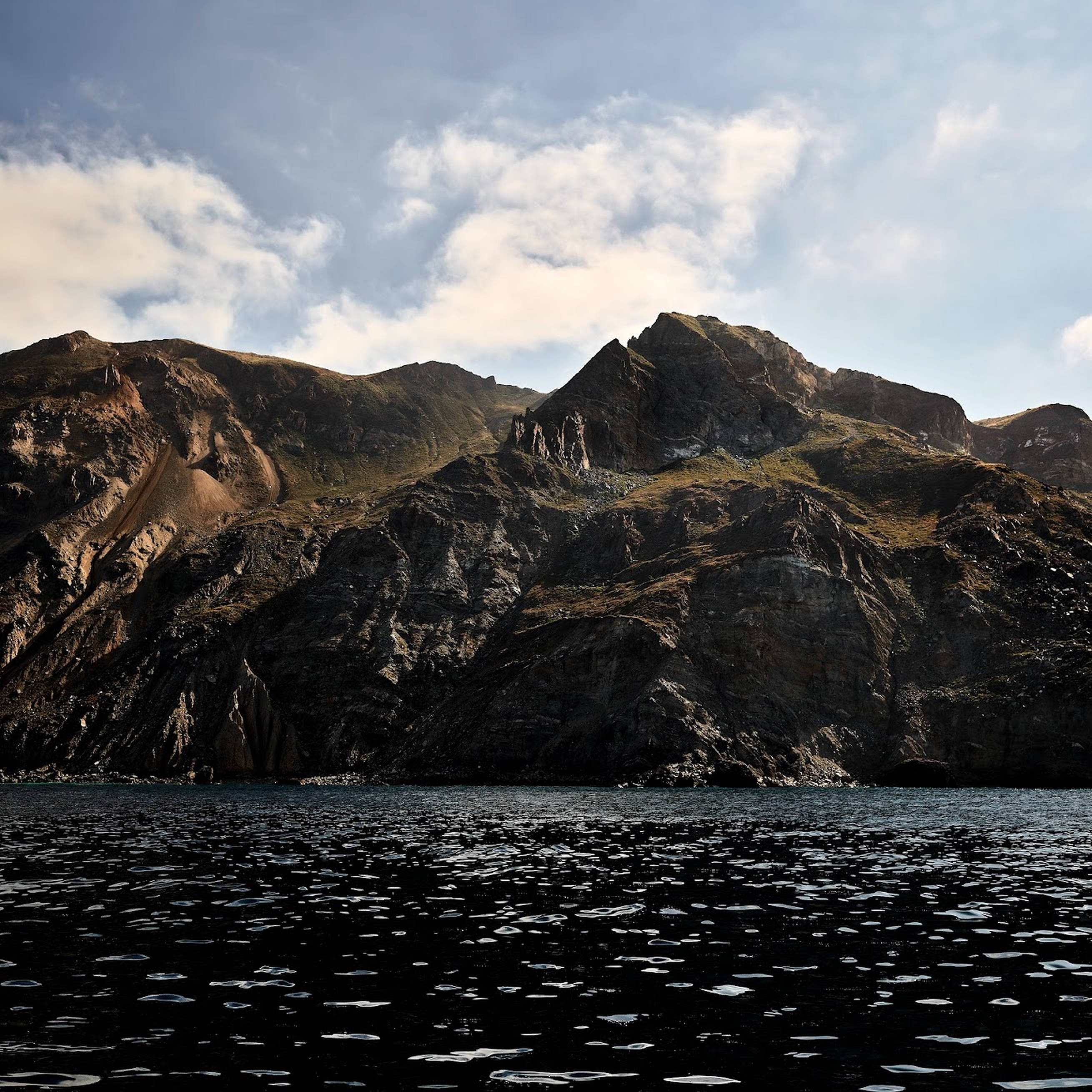 macOS Catalina, Black Sea, rugged mountain peaks, 2K Desktop Wallpaper
