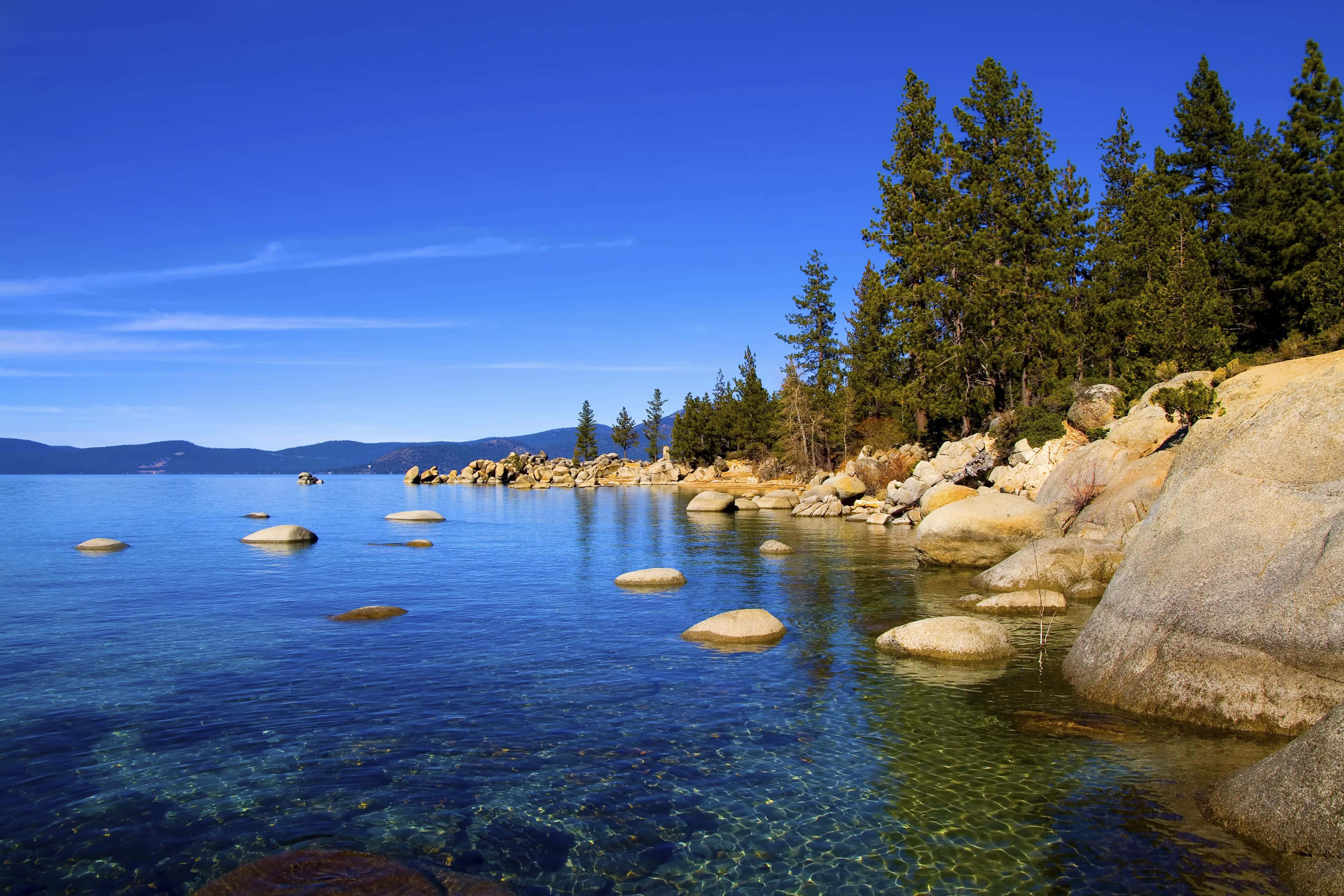 Lake Tahoe, turquoise lake water, sunlit granite rocks, 2K Desktop Wallpaper