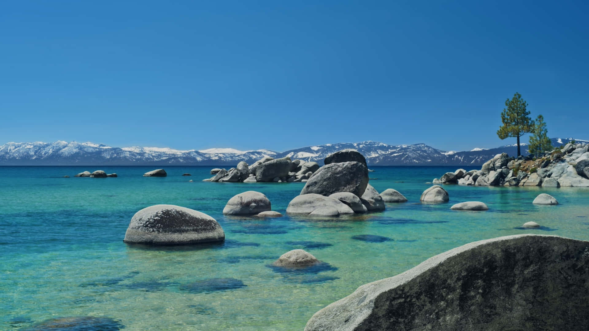 Lake Tahoe, turquoise waters, smooth gray boulders, Full HD Desktop Wallpaper