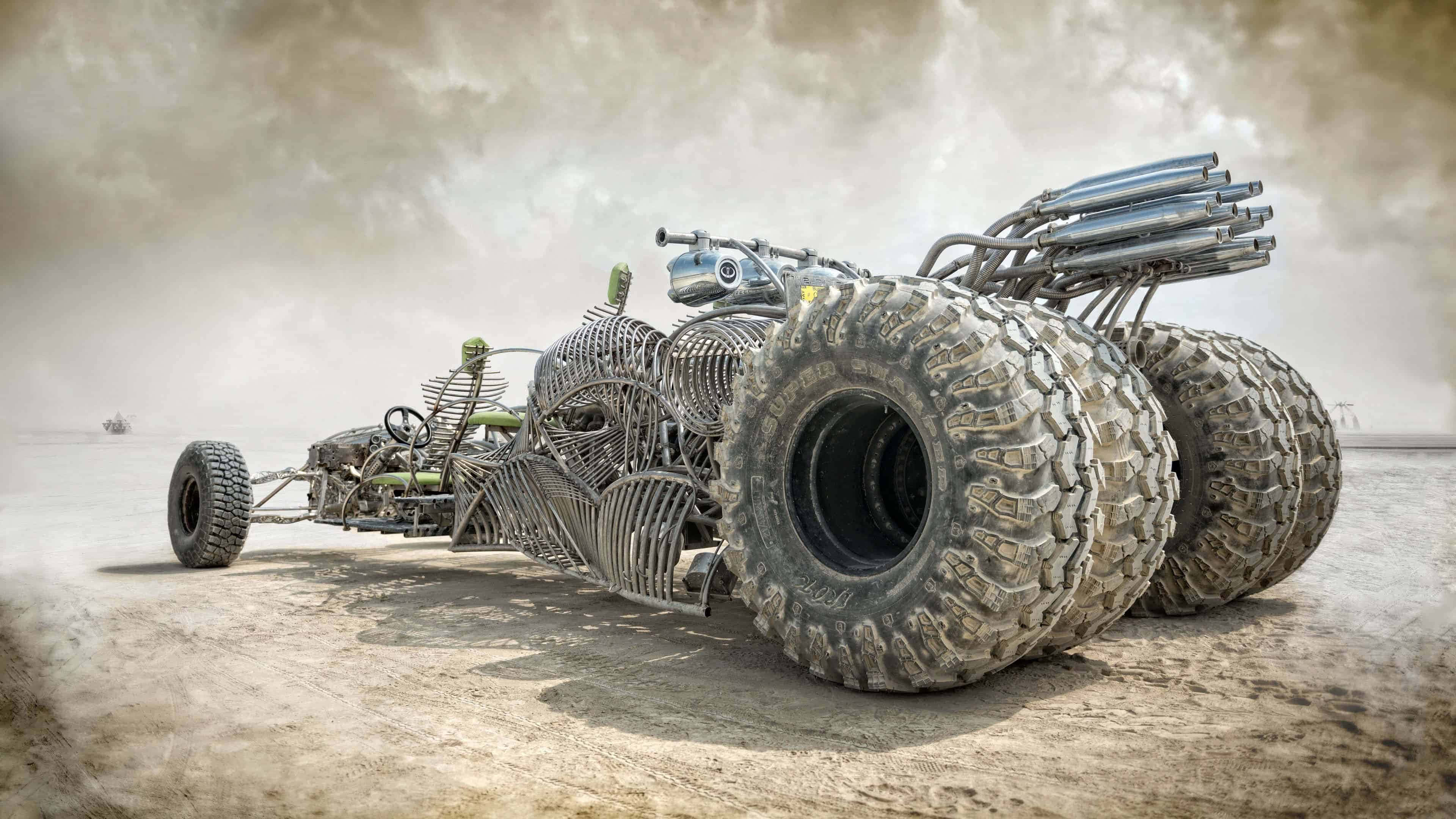 Mad Max Fury Road, skeletal metal monster truck, massive treaded tires, 4K Desktop Wallpaper