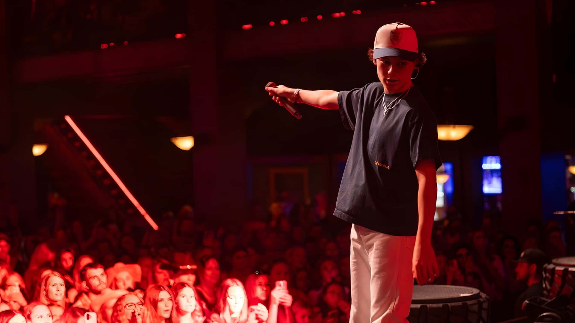 Maddox Batson, red-lit stage, cap, Full HD Desktop Wallpaper