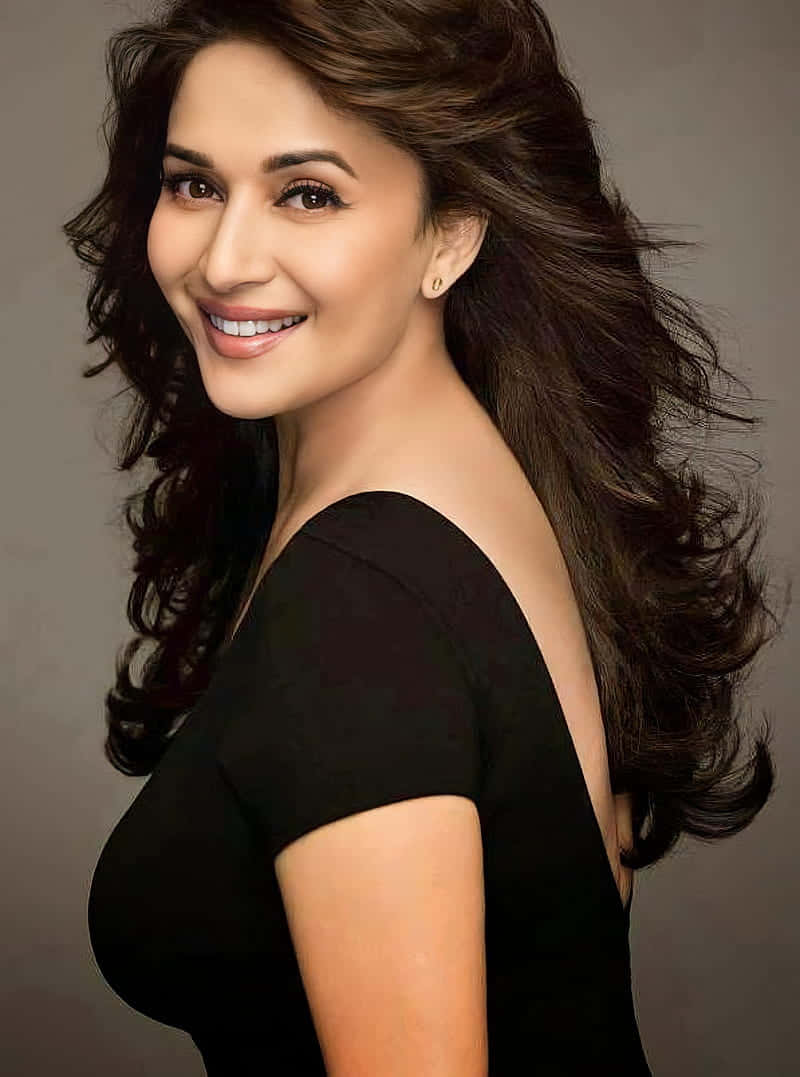 Madhuri Dixit, black off-shoulder top, long wavy dark hair, SD Phone Wallpaper