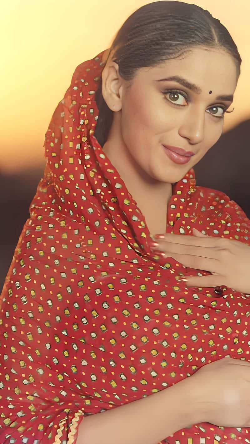 red patterned sari, gold accents, warm golden sunset backdrop, HD Phone Wallpaper