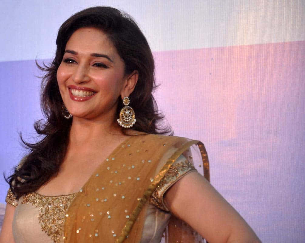 Madhuri Dixit, gold-beaded sari, soft purple and pink gradient backdrop, SD Desktop Wallpaper