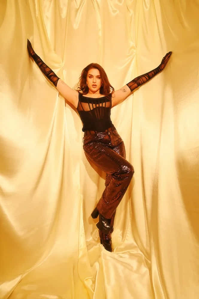 Mae Muller, black mesh top, shiny brown pants, SD Phone Wallpaper