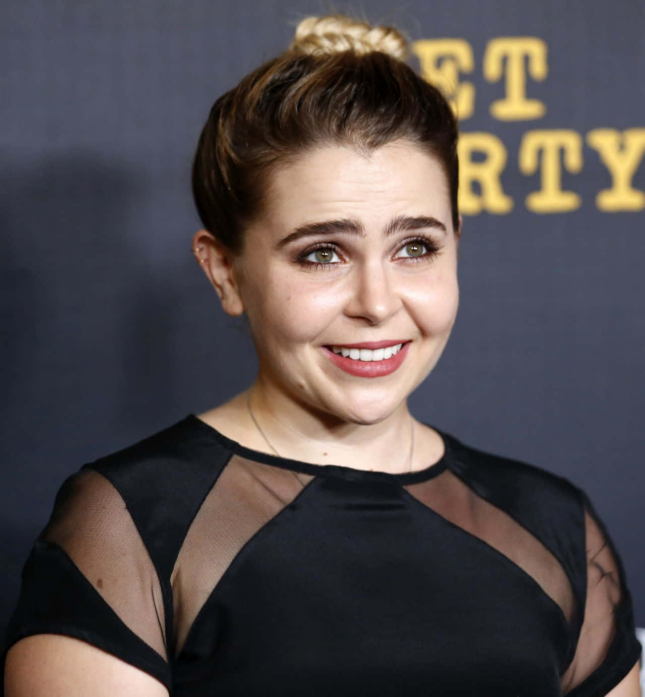 Mae Whitman, black sheer-sleeved dress, braided hair in a bun, HD Phone Wallpaper