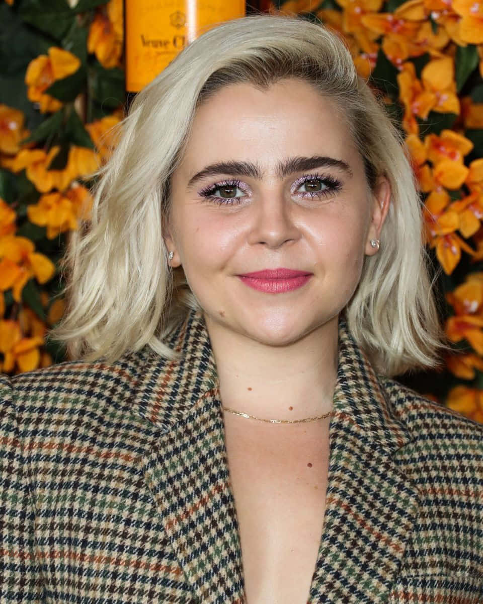 Mae Whitman, rooftop, vibrant orange floral backdrop, SD Phone Wallpaper