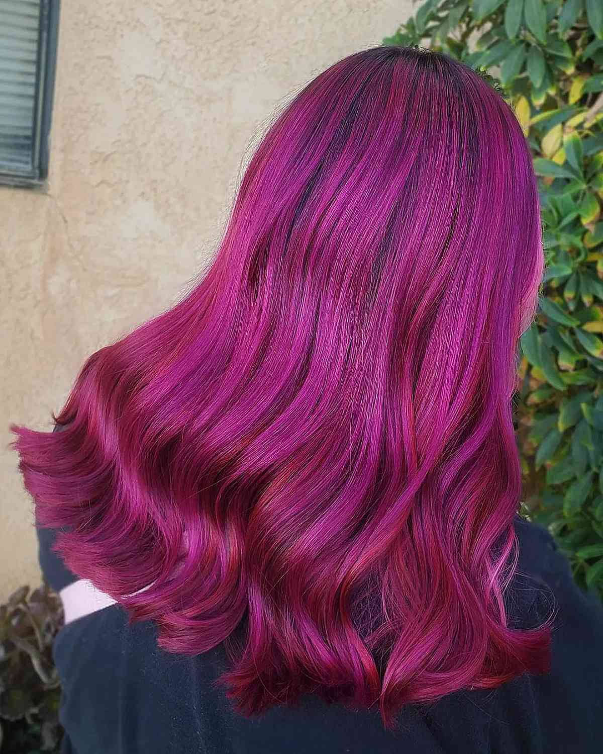 medium length wavy magenta hair, textured beige wall, green foliage, HD Phone Wallpaper