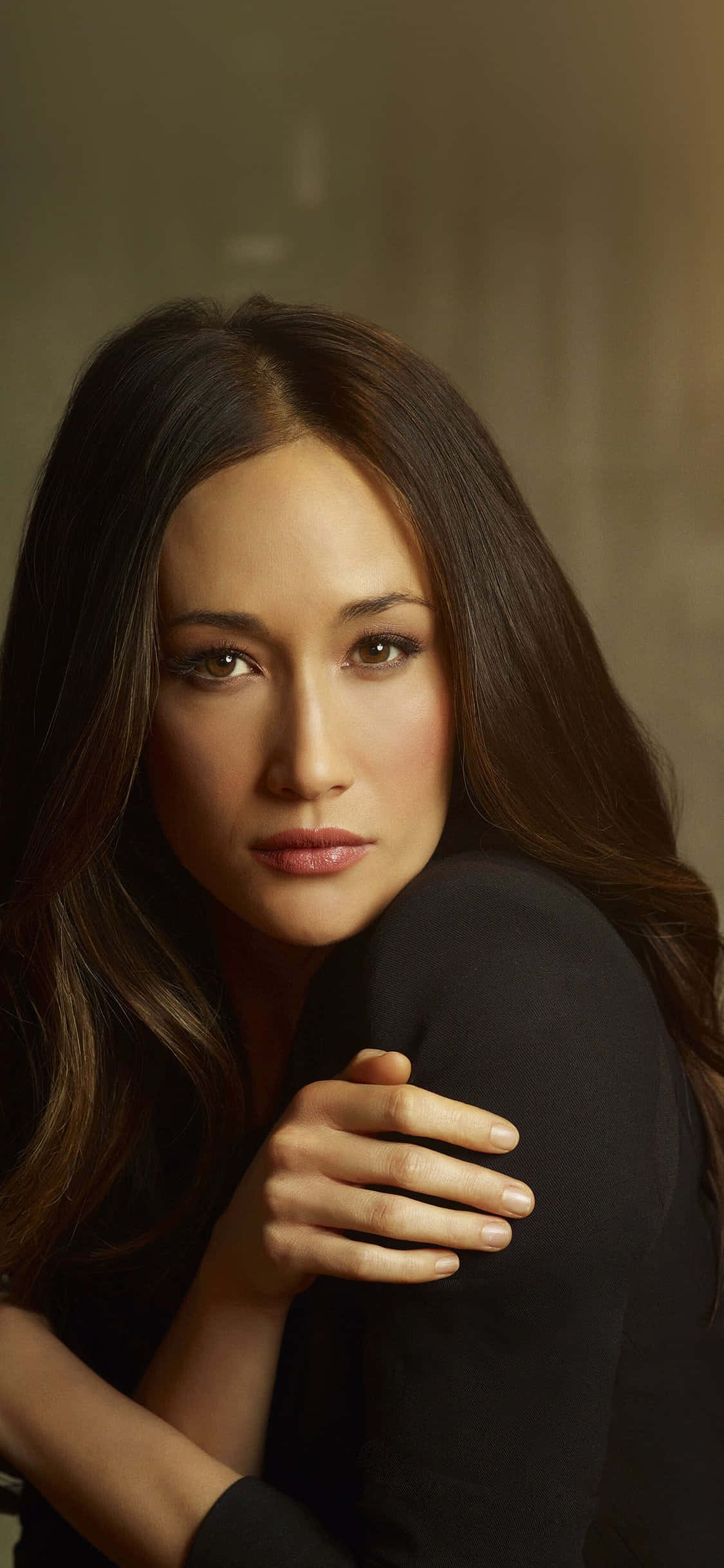 Maggie Q, long dark hair, muted brown background, Full HD Phone Wallpaper