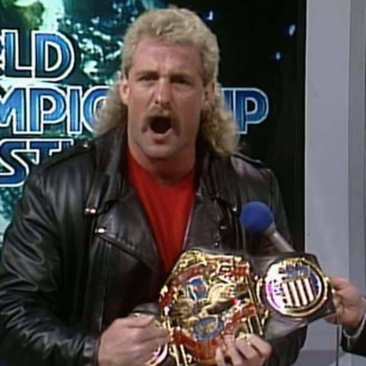 Magnum TA, gold championship belt, blue 'World Championship' backdrop, SD Desktop Wallpaper