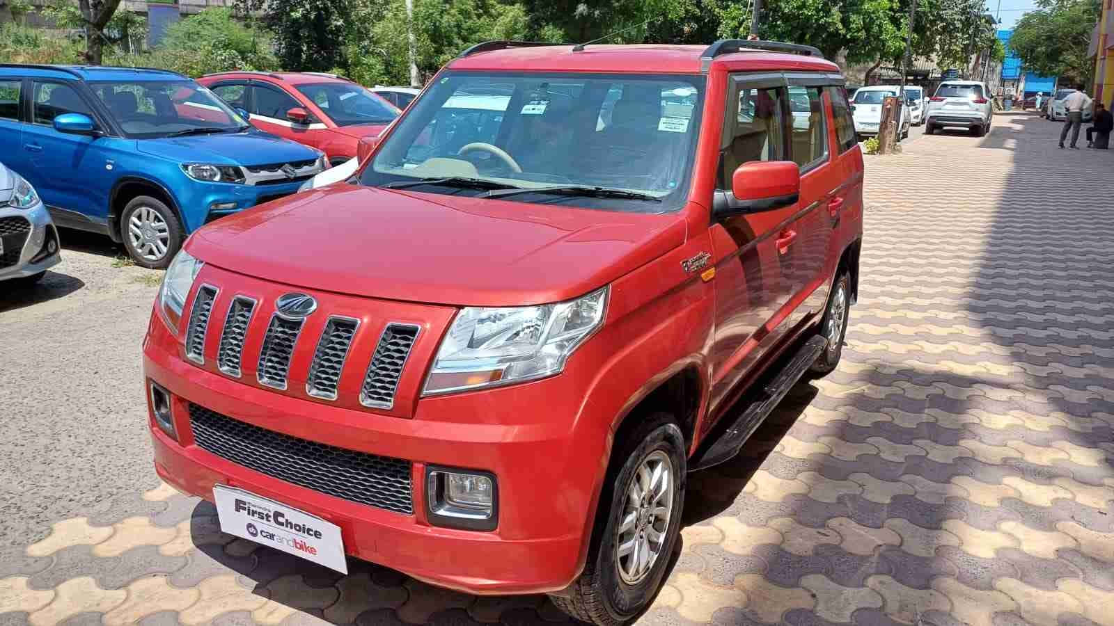 Red Mahindra TUV300, bold grille, chrome accents, HD Desktop Wallpaper