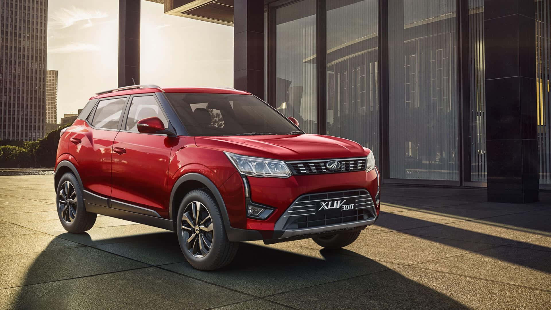 Mahindra XUV300, glossy red, modern glass building, Full HD Desktop Wallpaper