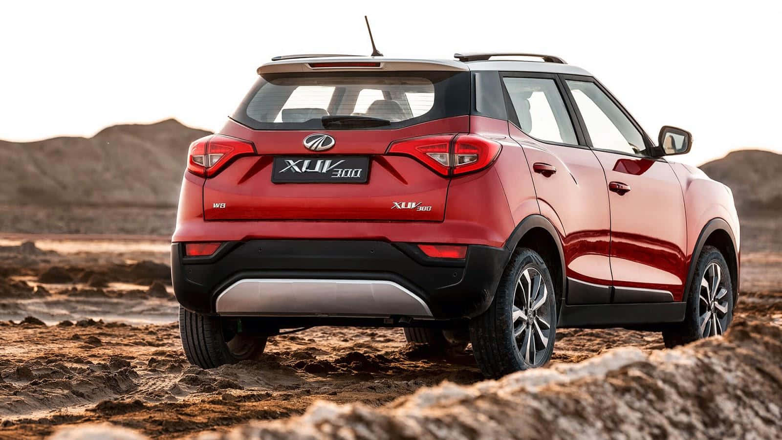 Mahindra XUV300, glossy red, rugged desert terrain, HD Desktop Wallpaper