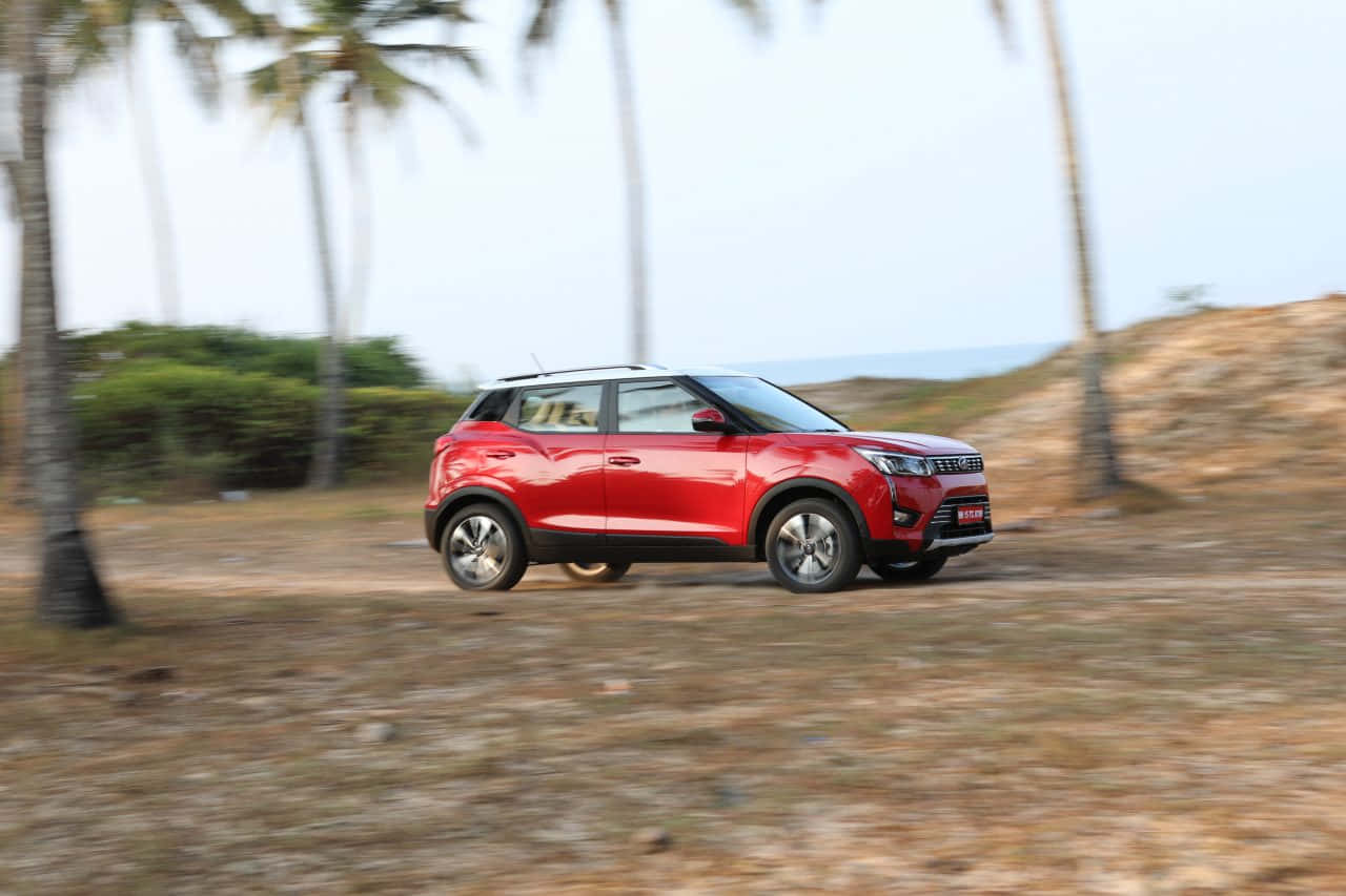 Mahindra XUV300, vibrant red, dusty terrain, HD Desktop Wallpaper