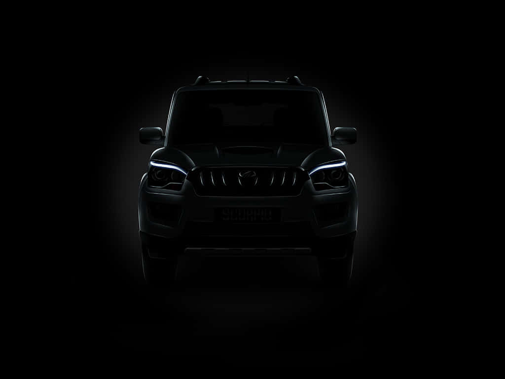 Mahindra XUV300, dark SUV silhouette, sharp white headlights, SD Desktop Wallpaper