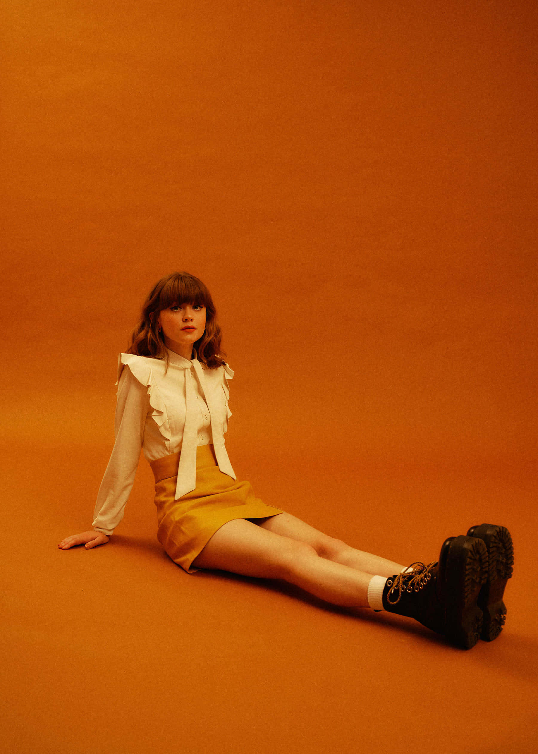 Maisie Peters, white blouse, yellow skirt, Full HD Phone Wallpaper