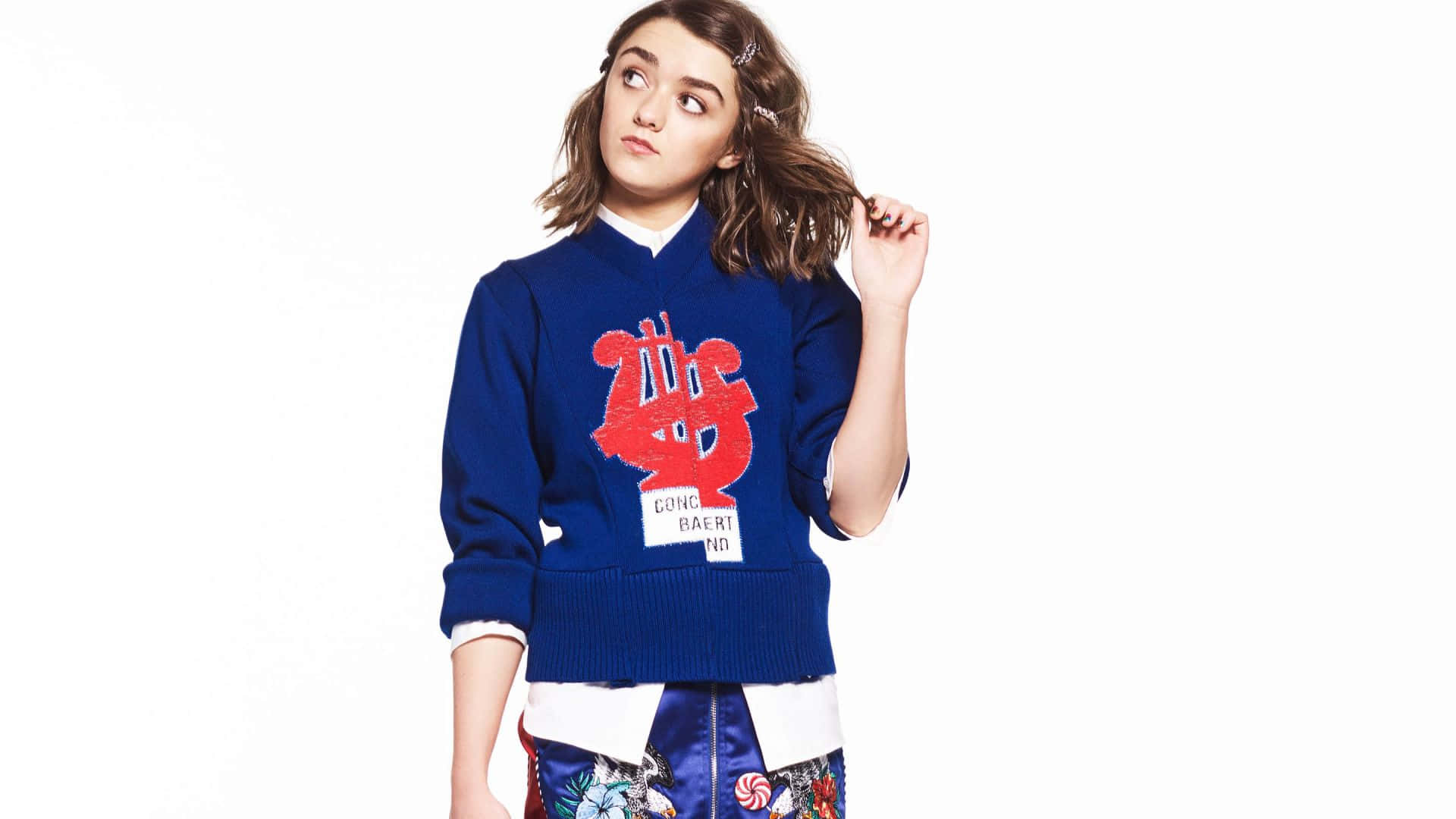 Maisie Williams, bold blue sweater, red graphic, Full HD Desktop Wallpaper