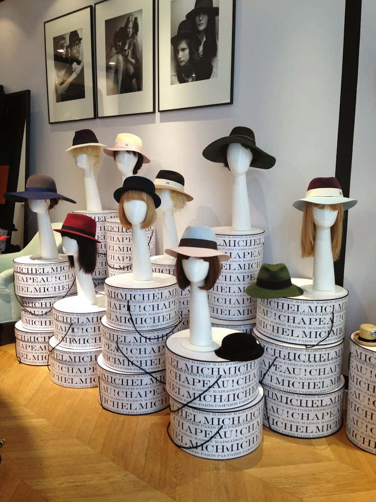 Maison Michel, mannequin heads, branded cylindrical stands, SD Phone Wallpaper