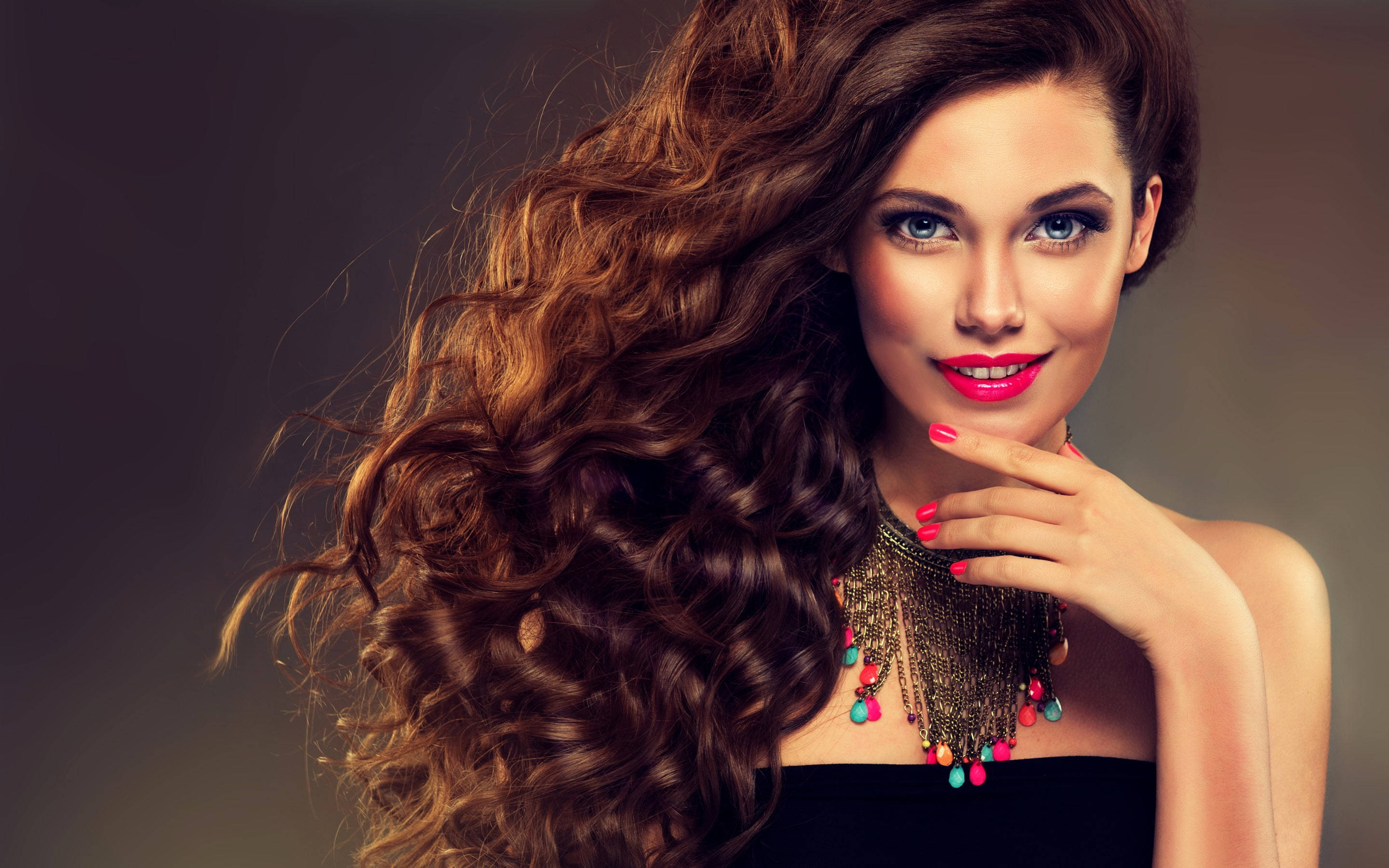 voluminous brown curls, bright pink lipstick, dark studio backdrop, 2K Desktop Wallpaper