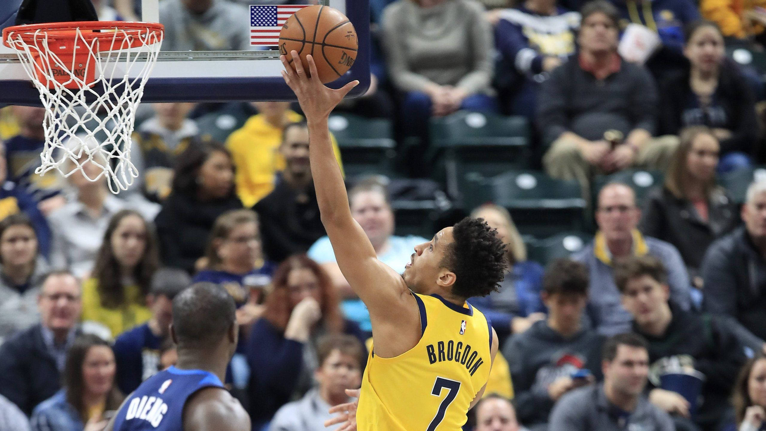 Malcolm Brogdon, yellow jersey, dunks the ball, 2K Desktop Wallpaper