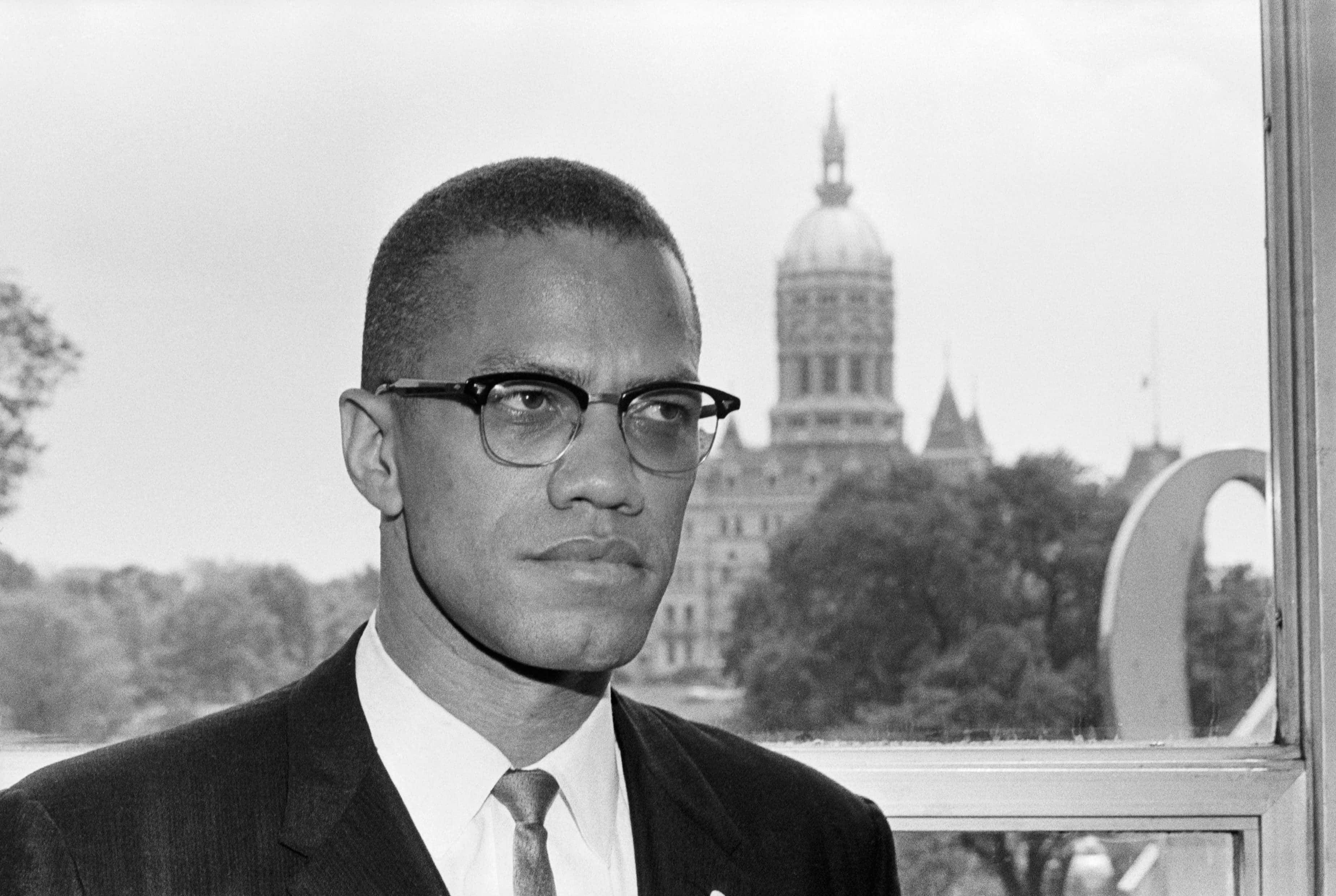 Malcolm X, suit, glasses, 2K Desktop Wallpaper