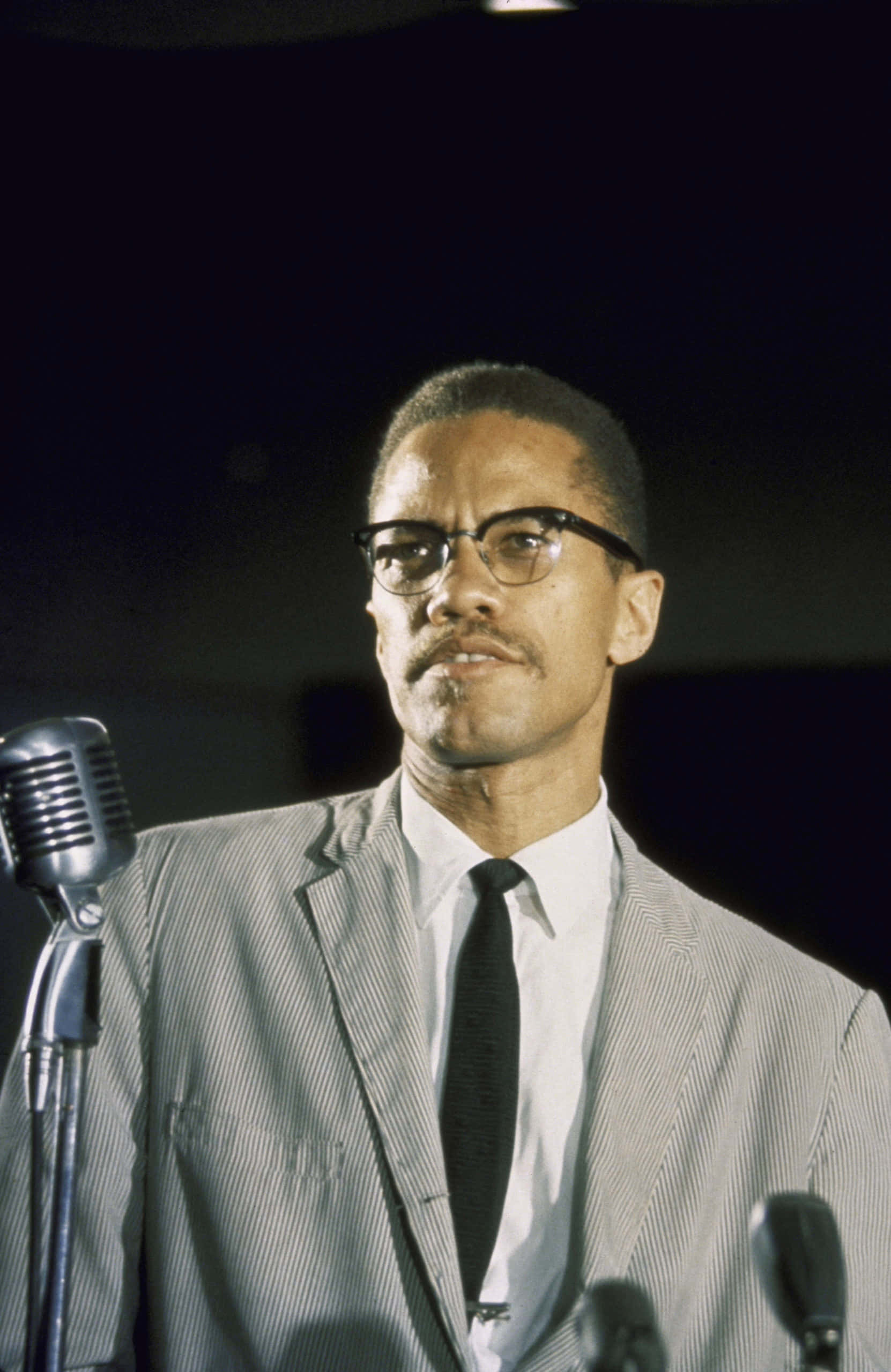 Malcolm X, vintage microphone, pinstripe suit, 2K Phone Wallpaper