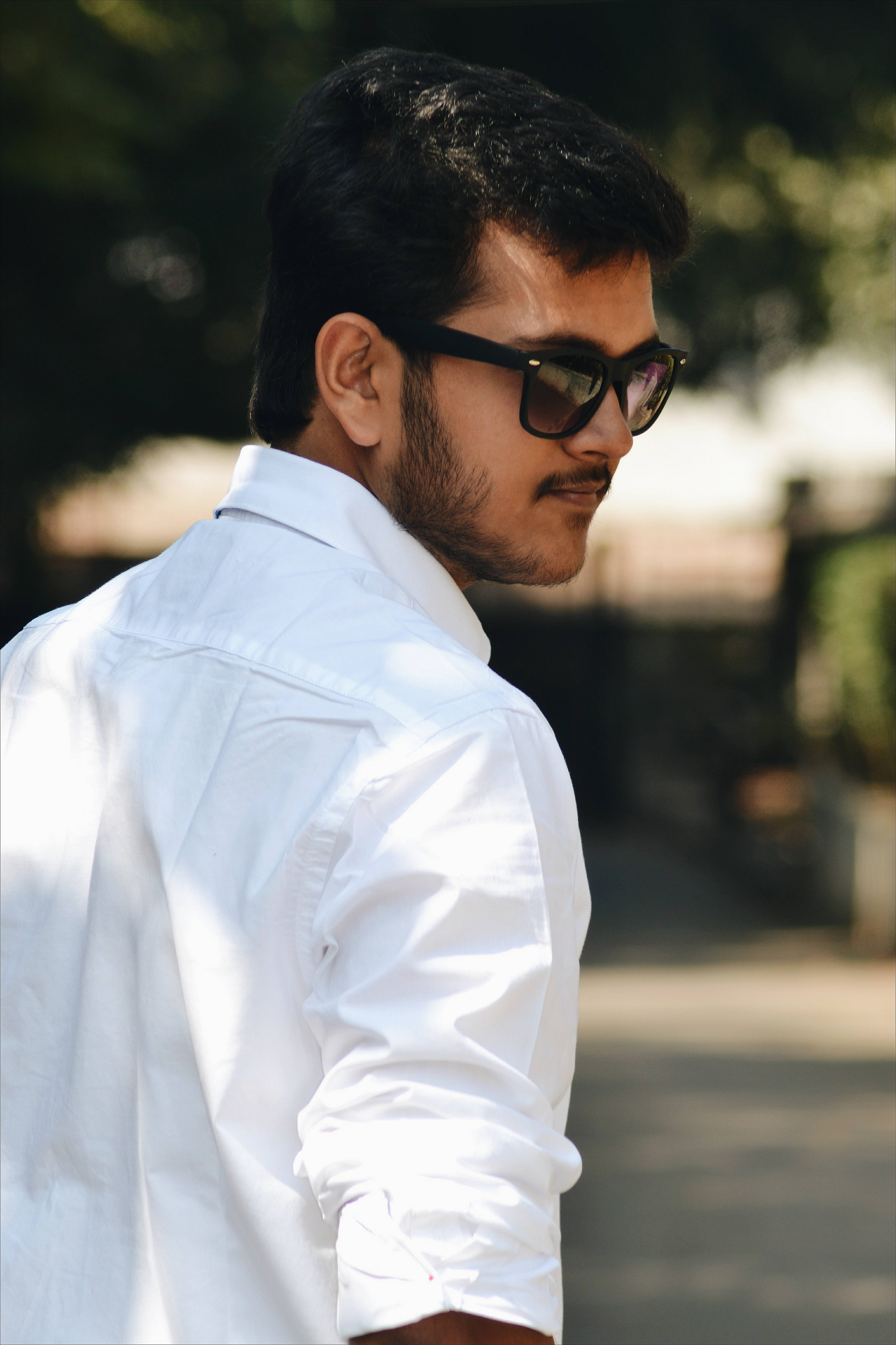 crisp white shirt, black sunglasses, sunlit outdoor backdrop, 4K Phone Wallpaper