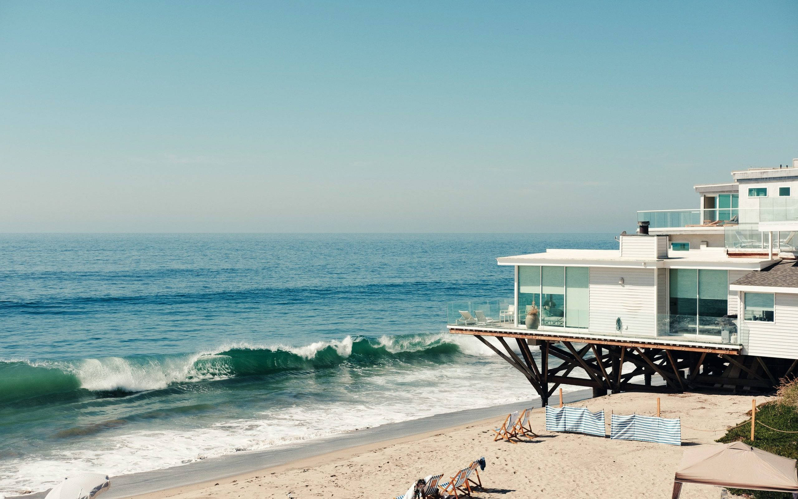 Malibu Beach, stilts, turquoise ocean, 2K Desktop Wallpaper