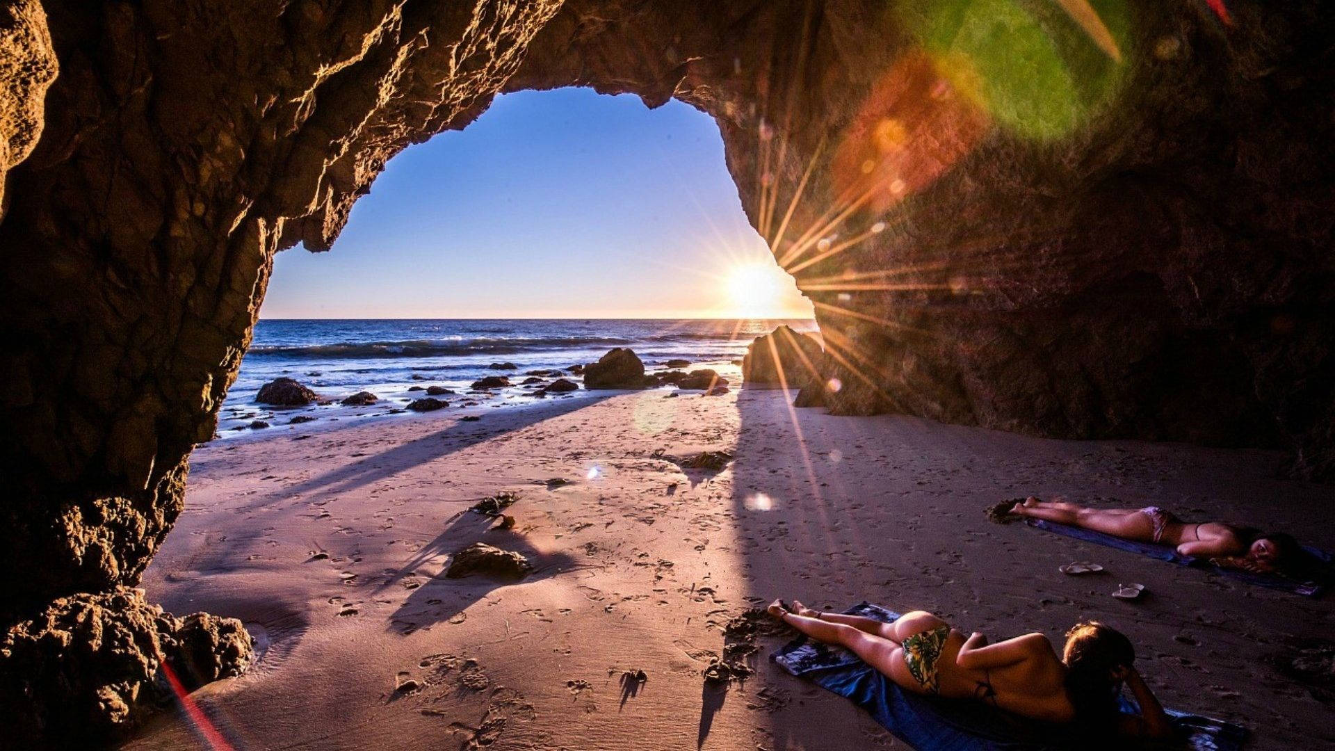 Malibu California, sunlit beach, rocky cave, Full HD Desktop Wallpaper