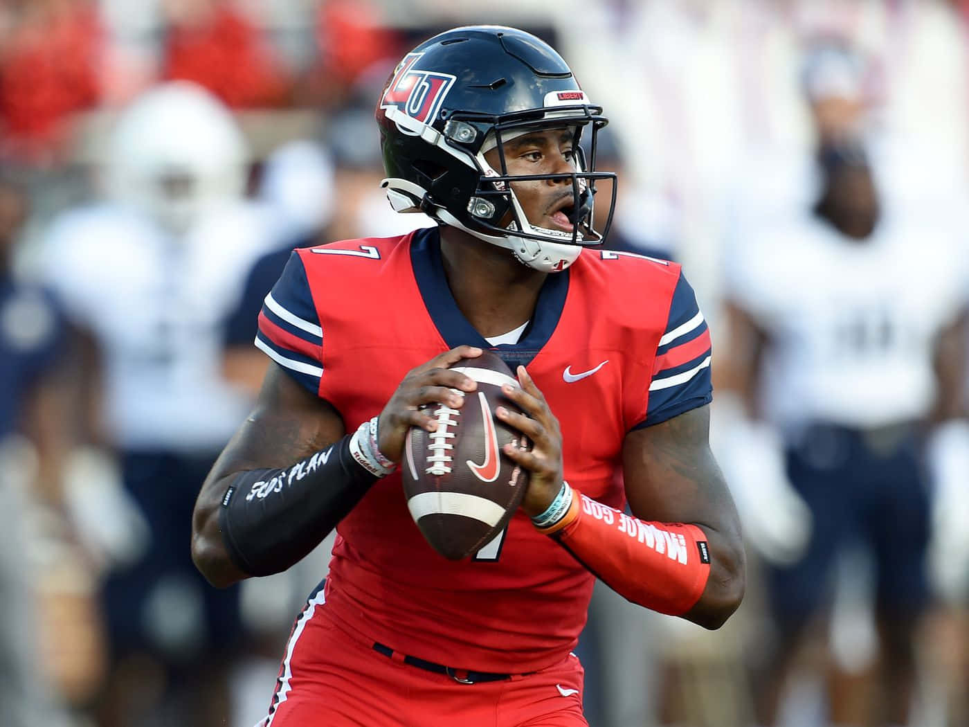 Malik Willis, quarterback, red uniform, HD Desktop Wallpaper