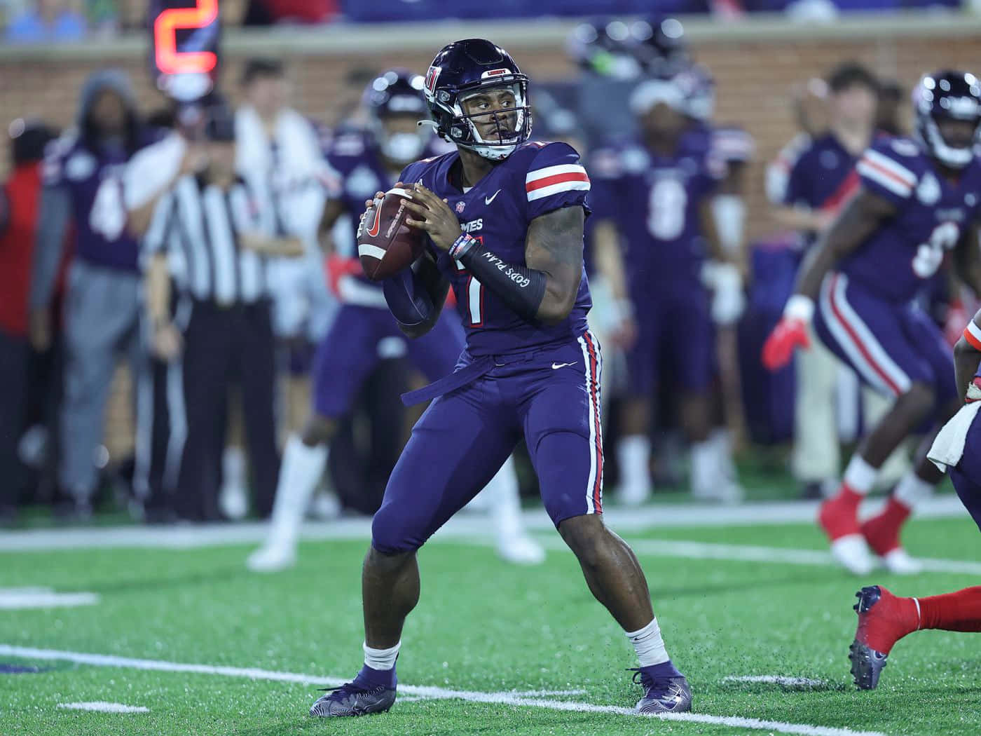 Malik Willis, purple uniform, stadium lights, HD Desktop Wallpaper