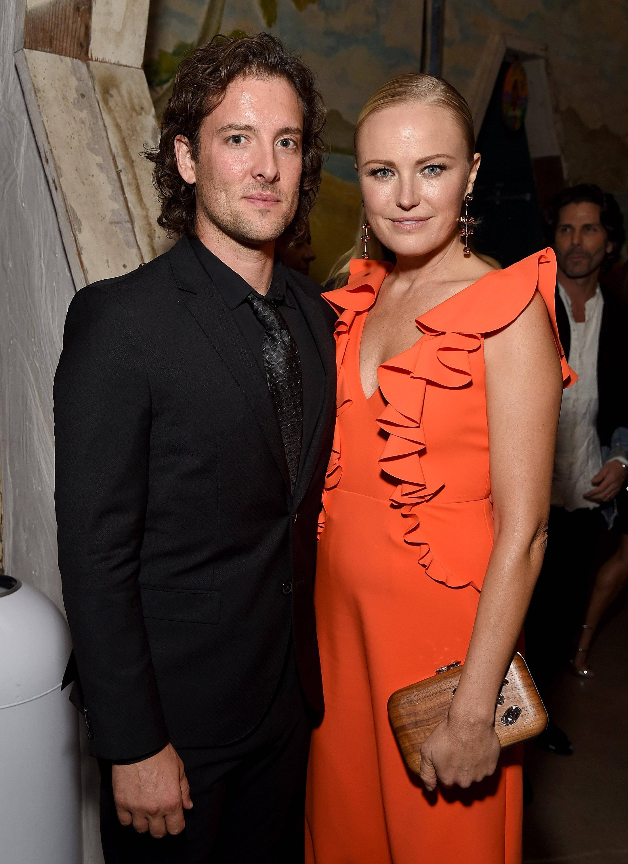 Malin Akerman, black suit, vibrant orange ruffled dress, 2K Phone Wallpaper