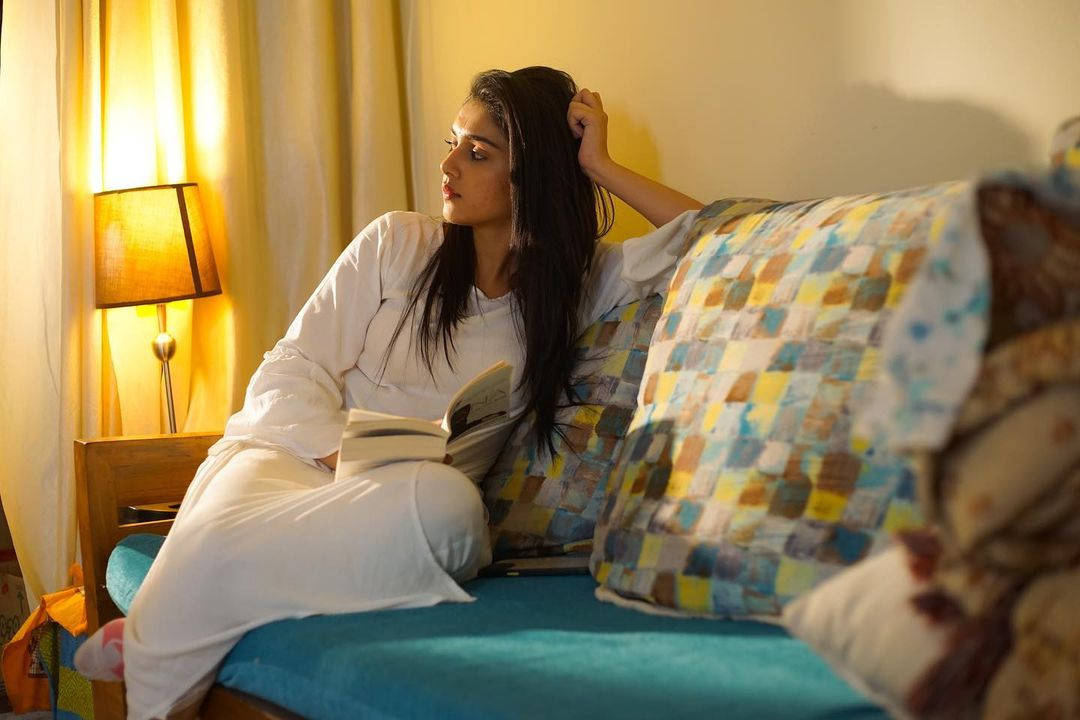 Mallika Singh, white loungewear, colorful patchwork couch, SD Desktop Wallpaper